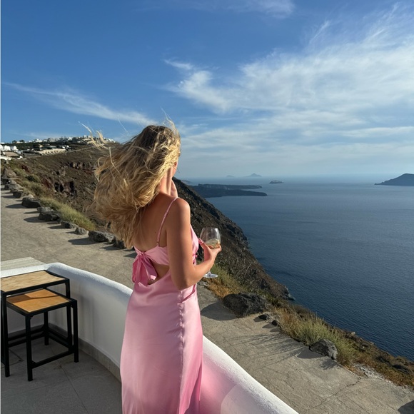 Pink satin dress with bow in front and in back. - Picture 2 of 3